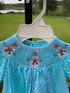 Turquoise Polka Dot Smocked Long-Sleeve Kids' Dress with Snowman Detail